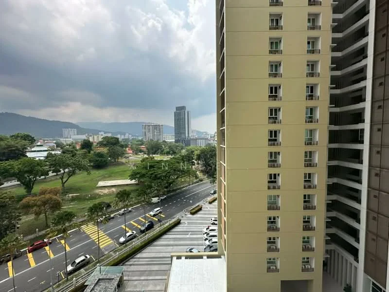 Exterior type: high-rise condominium; features: glass curtain wall, cream painted facade, approximately 20-storey high-rise, manicured lawn, surrounded by mature greenery, city skyline view, open-air parking lot, wide road with pedestrian crossing; style: modern.