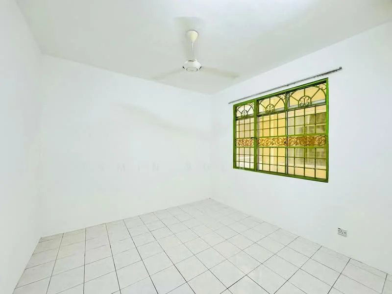 Room features: white painted walls, plain ceiling, ceiling fan, square tile flooring, green window with decorative grille, natural light from window; style: minimalist.