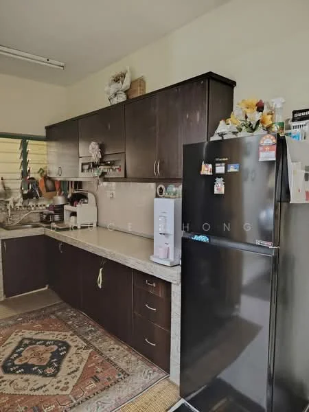 Kitchen features: dark wood cabinetry, granite countertop, stainless-steel fridge, built-in sink, chrome faucet, ceramic tile flooring, wall-mounted shelves, decorative items on shelves, area rug with geometric pattern, kitchen appliances visible; style: modern.
