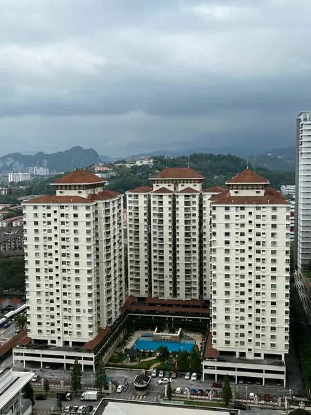 Exterior type: high-rise condominium; features: white painted facade, flat roof, approximately 10-storey high-rise, infinity pool, pool deck with loungers, landscaped garden area, covered parking, surrounded by mature greenery, urban context with nearby buildings, multiple balconies, main entrance with awning; style: modern.