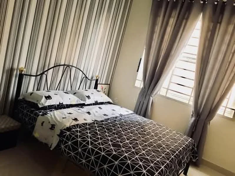 Bedroom features: queen-size bed with black metal frame, black and white geometric patterned bedding, striped wallpaper in light and dark tones, two bedside pillows with cat print, window with white blinds, grey curtains, small upholstered ottoman, light-colored flooring; style: modern.