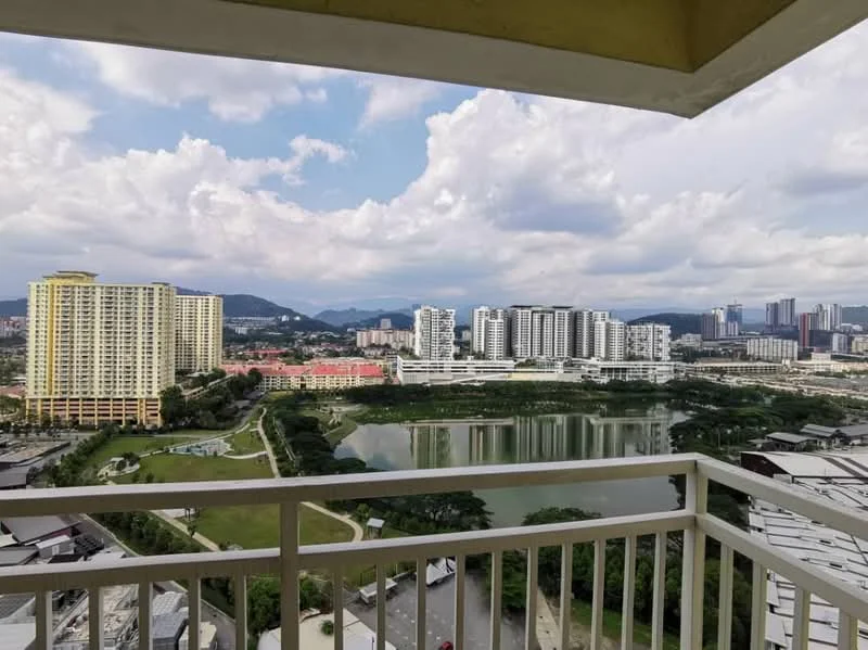 Exterior type: high-rise condominium; features: city skyline view, surrounded by greenery, water body in view, multiple high-rise buildings, open balcony railing, cloudy sky, urban landscape; style: modern.