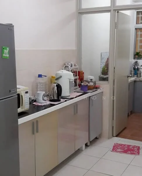 Kitchen features: stainless-steel fridge, white cabinetry with flat-panel doors, black countertop, microwave, electric kettle, water dispenser, ceramic tile flooring, wall-mounted cabinets, sink, decorative mat on floor.
