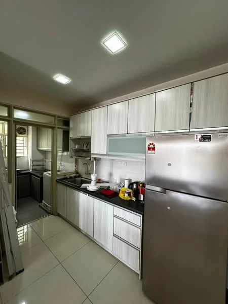 Kitchen features: light wood cabinetry, black countertop, stainless-steel fridge, built-in oven, ceramic tile flooring, recessed ceiling lights, double-bowl sink, chrome pull-down faucet, microwave, kettle, toaster, dishwasher, open shelving; style: modern. Laundry features: washer, dryer, shelving.