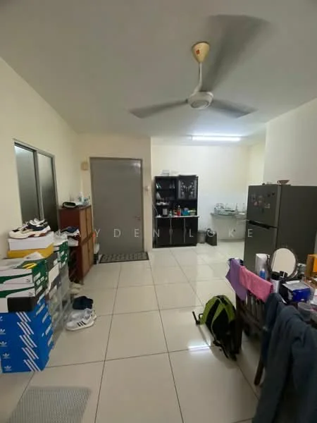 Room features: white painted walls, tile flooring, ceiling fan, refrigerator, wooden cabinet, glass display cabinet, shoe storage, dining table, multiple pairs of shoes, backpack, clothing hanging, countertop with various items.