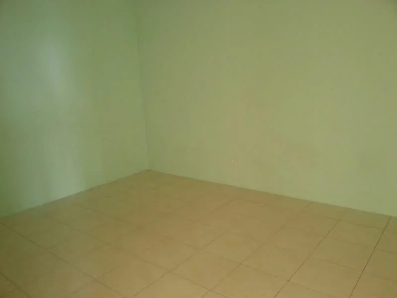 Room features: green painted walls, ceramic tile flooring.