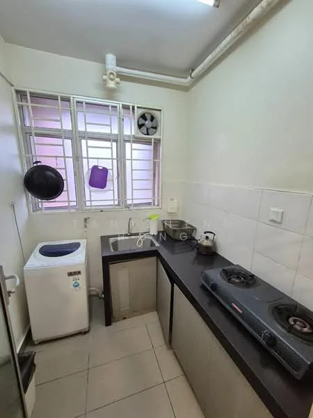 Kitchen features: white painted walls, grey tiled flooring, black countertop, single-bowl stainless-steel sink, chrome pull-down faucet, 2-burner gas hob, exhaust fan, window with metal grille, washing machine, cabinets below countertop; style: modern.
