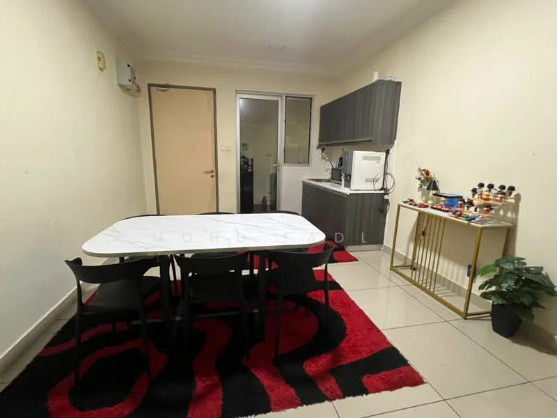 Dining features: white dining table, 4 black dining chairs, red and black area rug, cream painted walls, tile flooring, wall-mounted split AC, kitchenette with grey cabinets, microwave, white countertop, sink, decorative plant; style: modern.