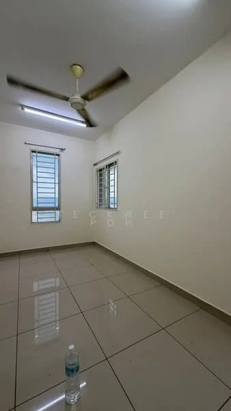 Room features: white painted walls, glossy ceramic tile flooring, ceiling fan, two windows with metal grilles, neutral color scheme, water bottle on floor.