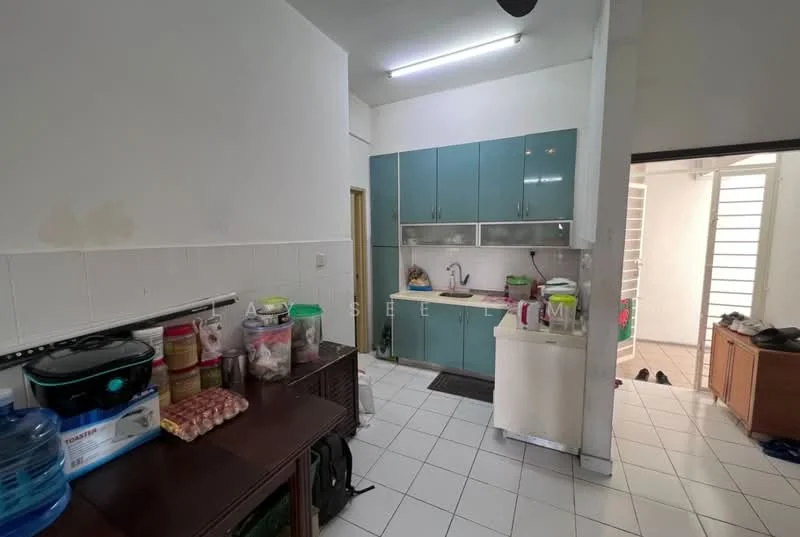 Kitchen features: green cabinetry, white tiled backsplash, single-bowl stainless-steel sink, chrome pull-down faucet, countertop with space for appliances, built-in stove, refrigerator, white walls, tile flooring, overhead fluorescent lighting; style: modern. Room features: open layout, white walls, tile flooring, doorway leading to another room.