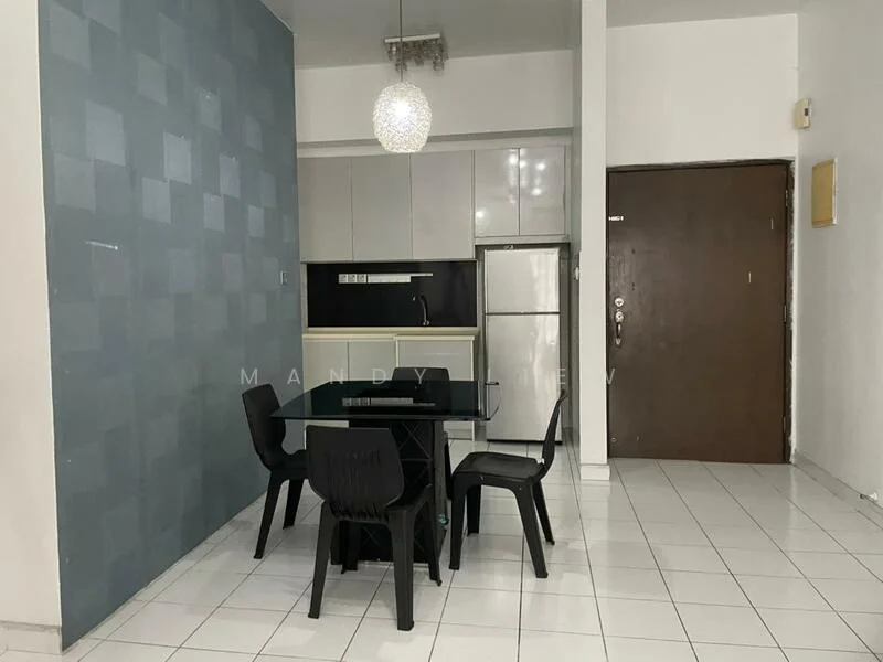 Dining features: black glass dining table, 4 black plastic dining chairs, white tiled flooring, blue accent wall with square pattern, kitchenette with grey cabinetry, stainless-steel fridge, pendant light fixture, door leading to hallway; style: modern.