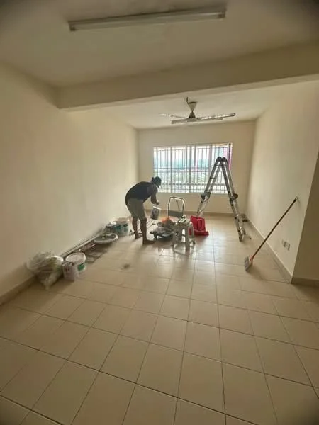 Room features: cream painted walls, tile flooring, ceiling fan, large window with metal grille, ladder, cleaning supplies, buckets, mop, tools on the floor.