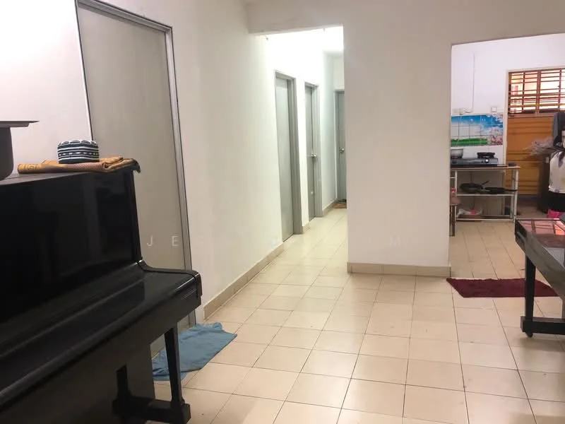 Room features: white painted walls, tile flooring, piano, doorways to multiple rooms, kitchen area visible in background, light fixtures, floor mats, open layout.