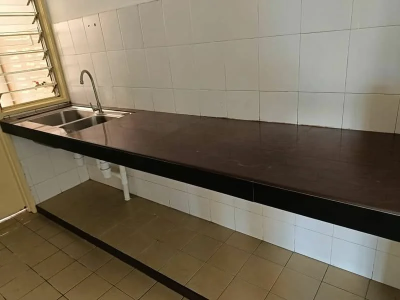 Kitchen features: single-bowl stainless-steel sink, chrome pull-down faucet, dark countertop, white tiled backsplash, white tiled walls, open shelving underneath countertop, ceramic tile flooring, window with horizontal slats.