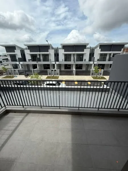 Room features: balcony with railing, grey tiled flooring, view of street, overcast sky, modern architectural design, surrounding buildings, concrete structure, paved road; style: modern; view: street.
