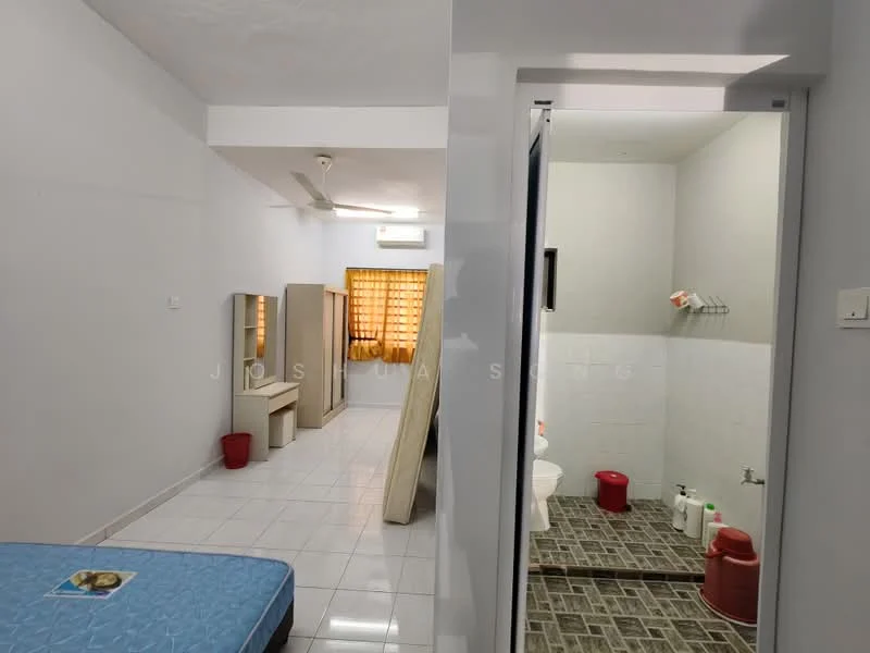 Room features: white painted walls, tile flooring, single bed, ceiling fan, window with sheer curtains, dressing table, wardrobe, bathroom door, toilet, sink, shower area, grey tiled flooring in bathroom; style: minimalist.