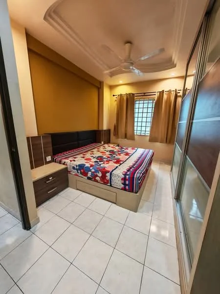 Bedroom features: king-size bed with patterned bedding, wooden bedside table, built-in wardrobe with sliding doors, white tiled flooring, cream painted walls, ceiling fan, window with sheer curtains, decorative ceiling with moulding; style: modern.