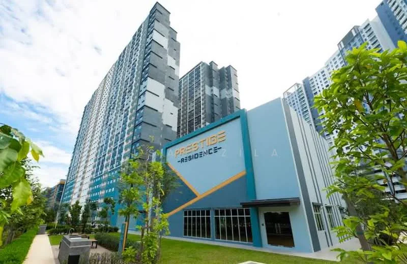 Exterior type: high-rise condominium; features: glass curtain wall, grey painted facade, recessed balconies, manicured lawn, tropical landscaping, surrounded by mature greenery; style: modern.