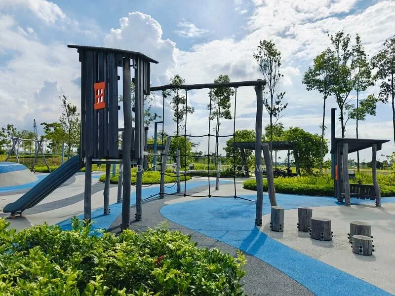 Exterior type: landscape garden; features: playground structure with slide, climbing frame, swing set, rubberized flooring, landscaped greenery, trees surrounding the playground, blue and grey color scheme on the ground, seating logs, open space, cloudy sky; style: modern.