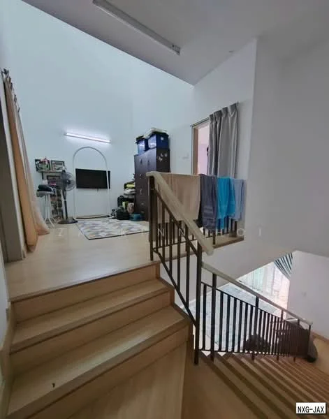 Room features: wooden staircase, light wood flooring, white painted walls, ceiling lights, TV mounted on wall, decorative area rug, clothes hanging on railing, storage cabinet, curtains, open space, high ceiling; style: modern.