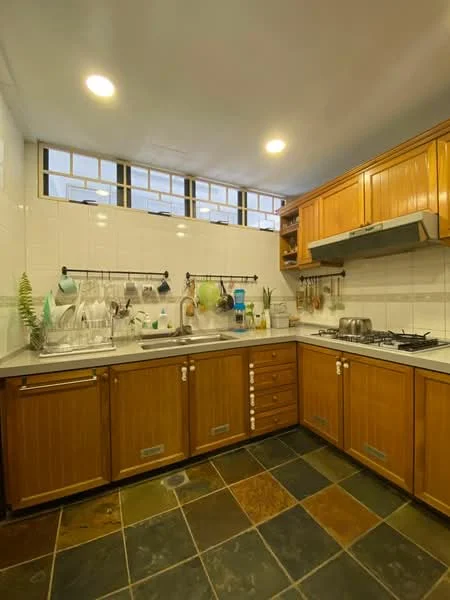 Kitchen features: wood cabinetry, grey countertop, stainless-steel sink, chrome pull-down faucet, 4-burner gas hob, built-in oven, slate tile flooring, white tiled backsplash, open shelving, hanging pot rack, window with grid design, kitchen utensils, dish rack; style: traditional.