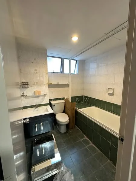 Bathroom features: white tiled walls, green tiled accent wall, bathtub, built-in sink with cabinet, one-piece toilet, mirror above sink, window for natural light, recessed lighting, dark grey floor tiles; style: modern.