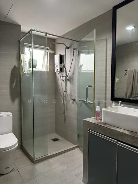 Bathroom features: walk-in shower with glass enclosure, rain shower head, handheld shower, single-sink vanity with grey cabinet, white ceramic sink, chrome basin mixer, one-piece toilet, tile cladding on walls, grey tile flooring, mirror above vanity, towel rack, window for natural light; style: modern.
