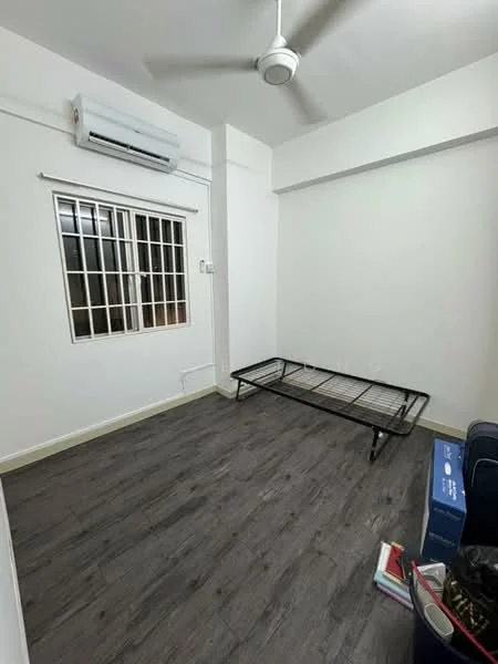 Room features: white painted walls, laminate flooring, 1 wall-mounted split AC, ceiling fan, window with grid pattern, metal bed frame, stacked boxes, minimal decor; style: modern.