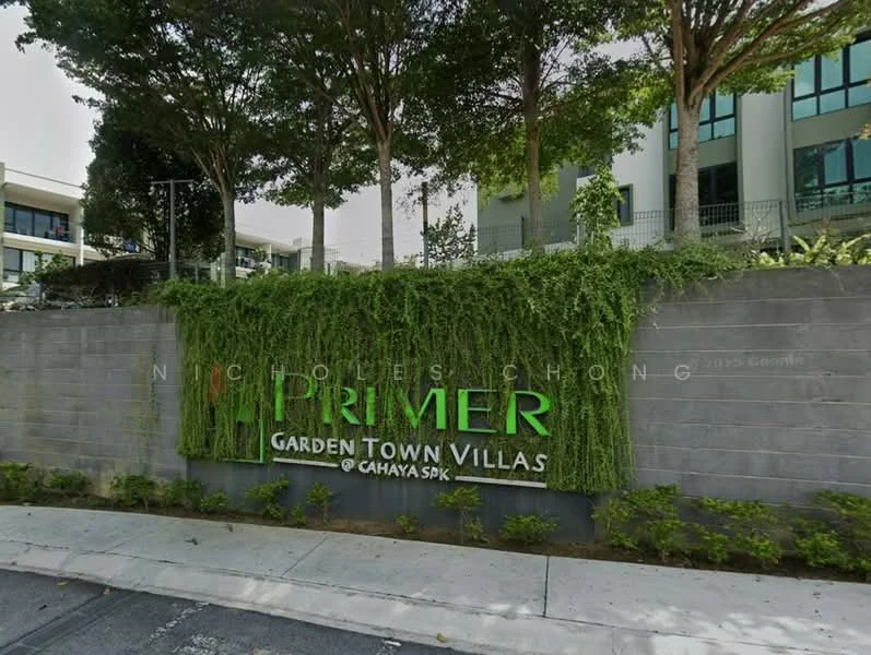 Exterior type: townhouse; features: landscape garden with greenery, signage with 'Primer Garden Town Villas', stone wall, paved walkway, mature trees, urban setting; style: modern.