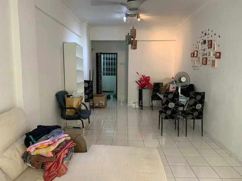 Living features: white painted walls, glossy white tile flooring, ceiling fan, sofa with light upholstery, stack of folded clothes, black dining chairs with floral pattern, decorative wall with photo frames, open space leading to another room, window with grille, floor lamp; style: minimalist.