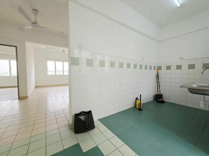 Room features: white painted walls, green and white tiled backsplash, green floor tiles, grey floor tiles, stainless-steel sink, wall-mounted faucet, ceiling fan, cleaning supplies, open layout to adjacent room, natural light from windows; style: modern; view: city.