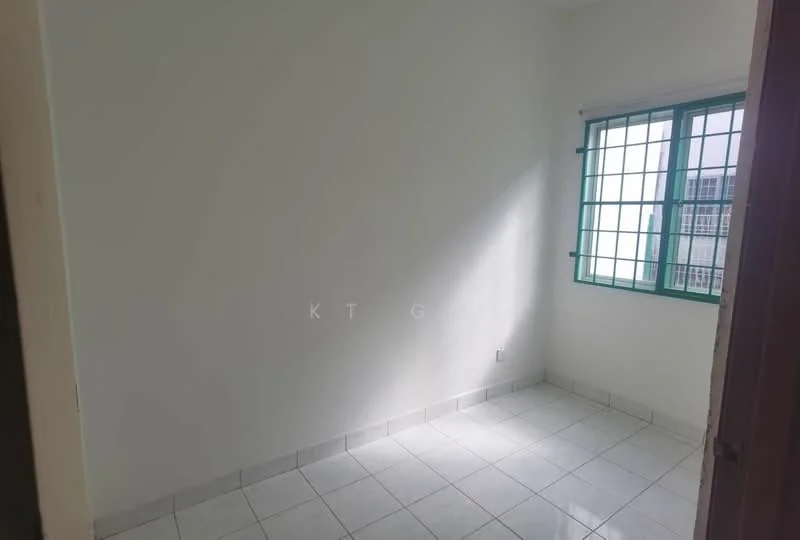 Room features: white painted walls, tile flooring, green window frames, grid-patterned windows, natural light from window, corner room, no visible furniture, neutral color scheme.
