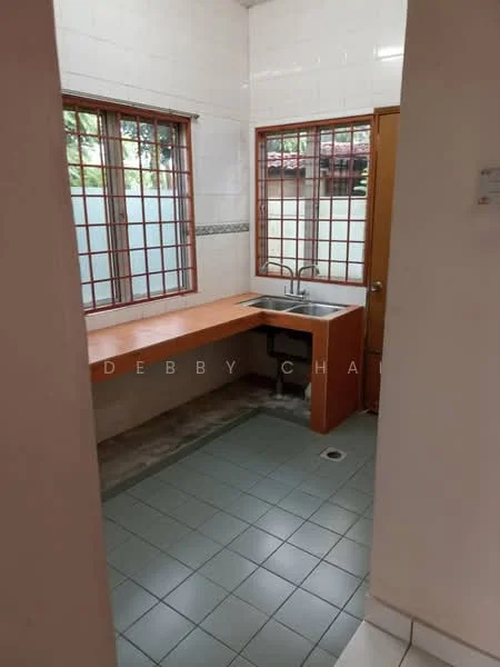 Kitchen features: orange laminate countertop, single-bowl stainless-steel sink, chrome pull-down faucet, green ceramic tile flooring, white tiled walls, wooden door, two windows with grid pattern, wall-mounted cabinet, backsplash with decorative tile.