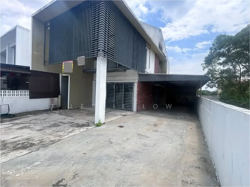Exterior type: semi-detached house; features: concrete facade, grey painted facade, horizontal slatted screen, car porch with awning, driveway with interlocking pavers, manicured landscaping, surrounded by greenery; style: modern.
