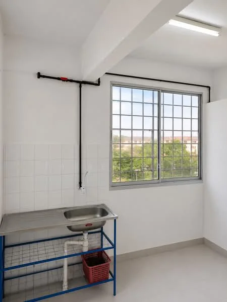 Laundry features: stainless-steel sink, blue metal frame table, white tiled walls, grey floor tiles, large window with grid pattern, pipe installation on wall, red plastic basket; style: modern; view: garden.