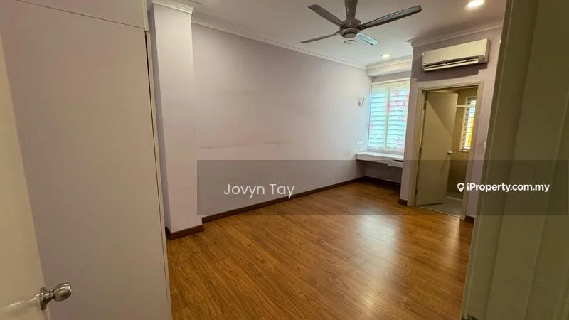 Room features: light wood laminate flooring, purple painted walls, white ceiling with crown moulding, 5-blade ceiling fan, window with horizontal blinds, built-in desk area, air conditioning unit on wall, door leading to another room; style: modern.