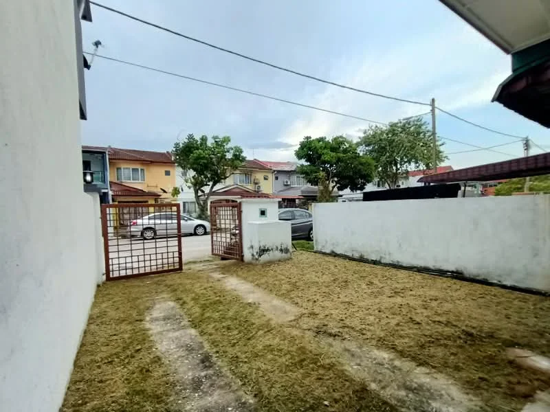 Exterior type: linked terrace house; features: white painted facade, manicured lawn, gravel pathway, metal gate, surrounding residential houses, street view, fenced perimeter, mature trees; style: modern.