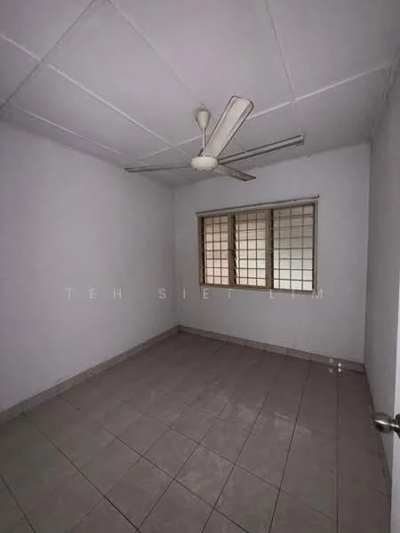 Room features: white painted walls, tiled flooring, ceiling fan, window with grid pattern, neutral color scheme, no visible furniture, plain ceiling, single light fixture.