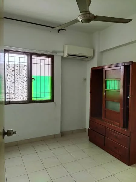 Room features: white painted walls, tile flooring, ceiling fan, wall-mounted split AC, window with metal grille, wooden wardrobe, natural light from window.