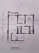 Floor plan: 3-bedroom 2-bathroom unit; features: open-plan kitchen-dining-living, master bedroom with ensuite bathroom, bedroom 2 with shared bathroom, utility room, laundry area, central foyer, balcony off living room, 2 car porch.