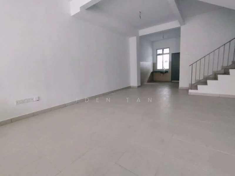 Room features: white painted walls, light-colored tile flooring, staircase with metal railing, large window for natural light, open layout, corner kitchen area, no visible furniture, high ceiling; style: modern.