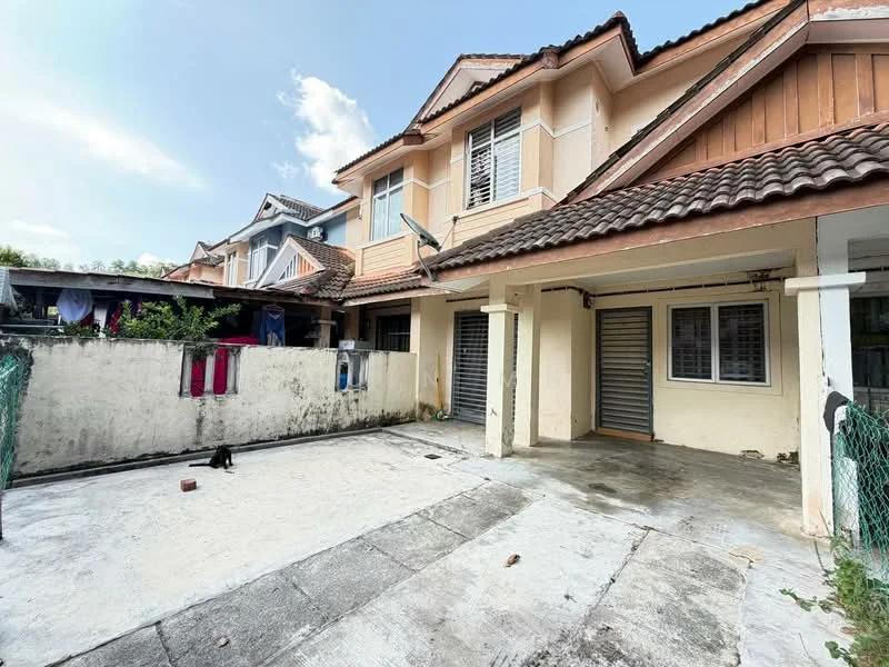 Exterior type: linked terrace house; features: two-storey building, tiled roof, cream painted facade, concrete driveway, fenced yard, laundry area with hanging clothes, open parking space, visible neighboring houses, front porch area, sliding metal gate; style: modern.