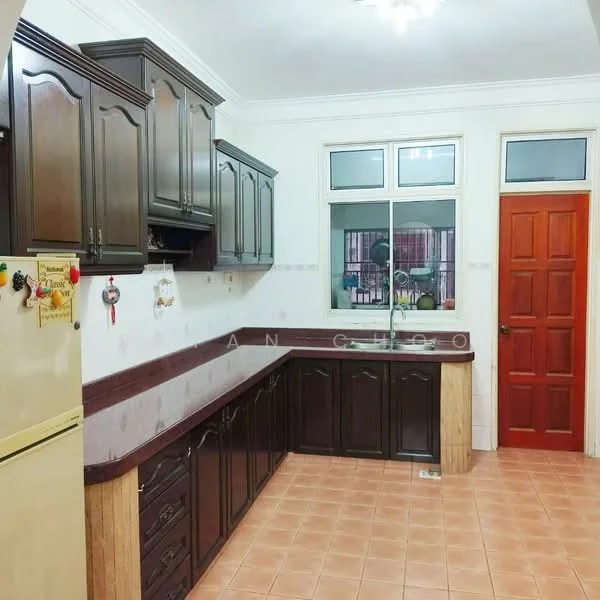 Kitchen features: dark wood cabinetry, laminate countertop, single-bowl stainless-steel sink, chrome pull-down faucet, built-in oven, freestanding fridge, tile flooring, window above sink, light fixture on ceiling, cream painted walls, door leading to hallway; style: traditional.