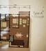 Floor plan: 2-bedroom 2-bathroom unit; features: open-plan kitchen-dining-living, master bedroom with ensuite bathroom, bedroom 2 with shared bathroom, utility room, balcony off living room, central foyer, 1 car porch.