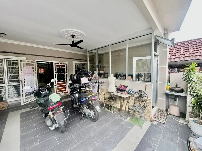 Room features: grey tiled flooring, ceiling fan, glass enclosure, stone feature wall, metal outdoor furniture, motorcycles parked, decorative plants, open space layout; style: modern; view: garden.