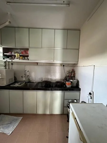 Kitchen features: black countertop, white cabinetry with glass fronts, double-bowl stainless-steel sink, chrome pull-down faucet, 4-burner gas hob, built-in oven, microwave, refrigerator, tile backsplash, cream tiled walls, brown tiled flooring, overhead cabinets, under-cabinet lighting; style: modern.