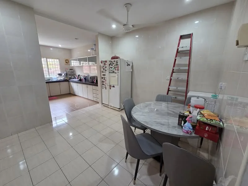 Kitchen features: white tiled walls, cream tiled flooring, ceiling fan, round marble dining table, 4 grey dining chairs, stainless-steel fridge, built-in kitchen cabinets, countertop with appliances, window with grid pattern, ladder against the wall; style: modern.