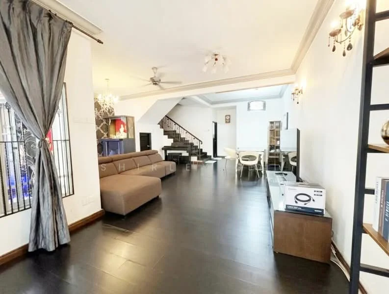 Living features: dark wood flooring, white painted walls, sofa in brown fabric, ceiling fan with light, chandelier, wall-mounted TV, coffee table, decorative wall sconces, large windows with sheer curtains, staircase in background, open layout to dining area; style: modern.