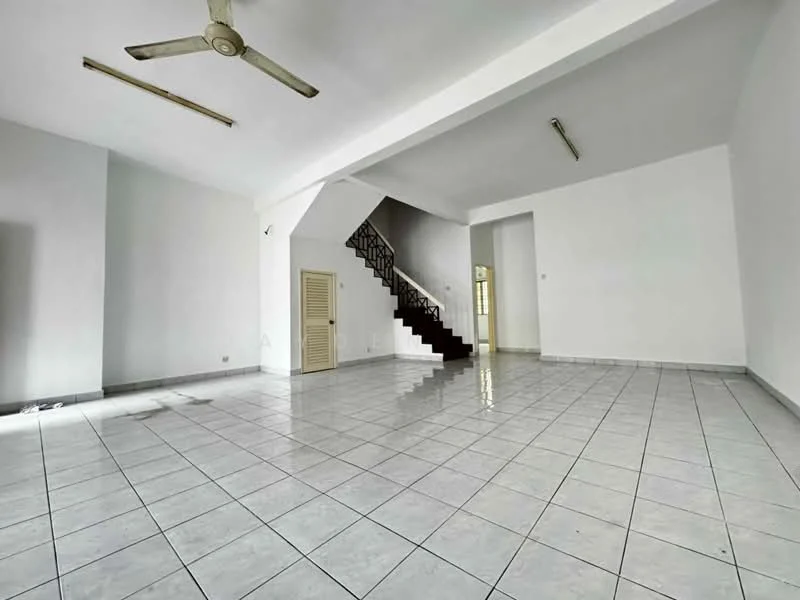 Living features: white painted walls, glossy white floor tiles, 5-blade ceiling fan, staircase with wrought iron railing, large windows for natural light, open layout, no visible furniture, high ceiling; style: modern.