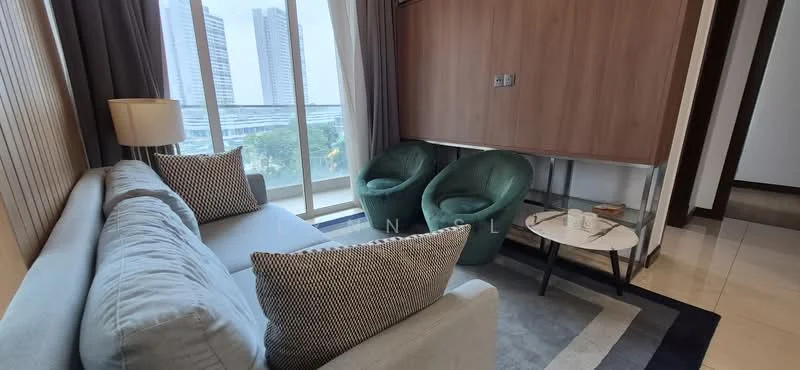 Living features: light grey fabric sofa, two green accent chairs, round coffee table with glass top, decorative cushions, floor-to-ceiling windows, curtains, neutral wall colour, tile flooring, wall-mounted panel, city view; style: modern; view: city.
